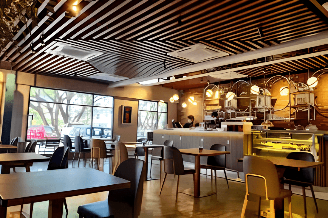 LUPA Café main dining area with warm lighting and modern ceiling design