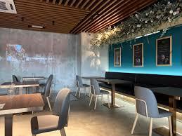 Modern seating area with turquoise accent wall